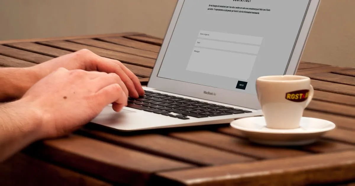 A website with a contact form open on a laptop