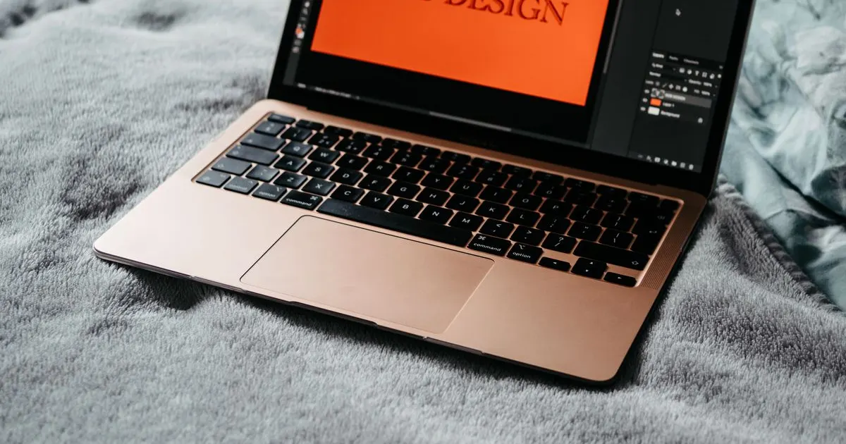 A laptop showing a web design project